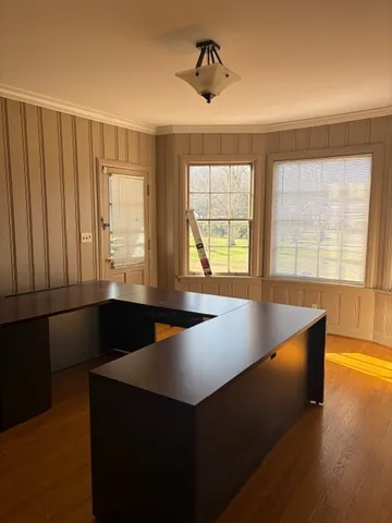 a view of an empty room with windows
