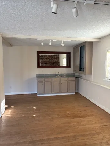 a view of a kitchen with a sink and dishwasher