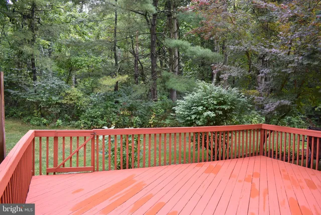 a view of balcony with wooden floor