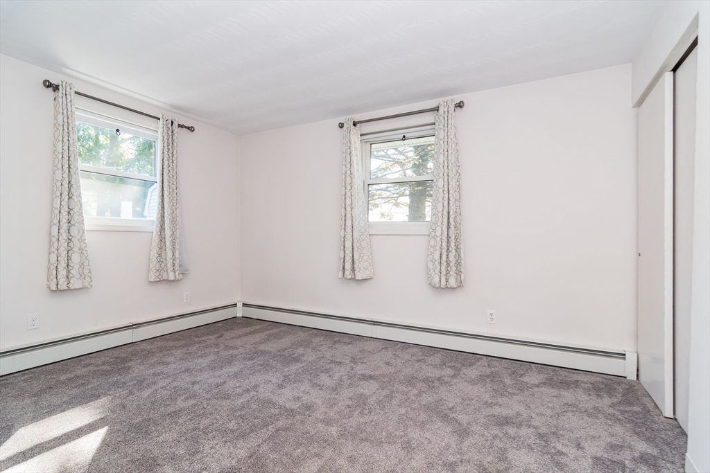 14 Rosslare Road Framingham, MA 01701 - Photo 14 of 20 an empty room with windows