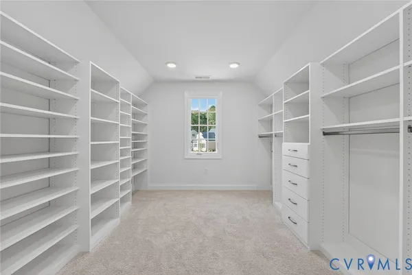 a view of an empty walk in closet