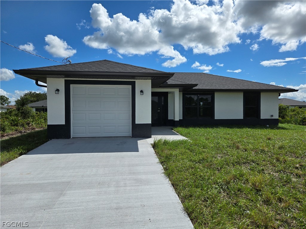 2707 30th Street Southwest Lehigh Acres, FL 33976 - Photo 1 of 27