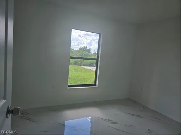 an empty room with a window
