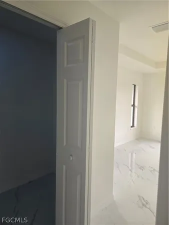 an empty room with window