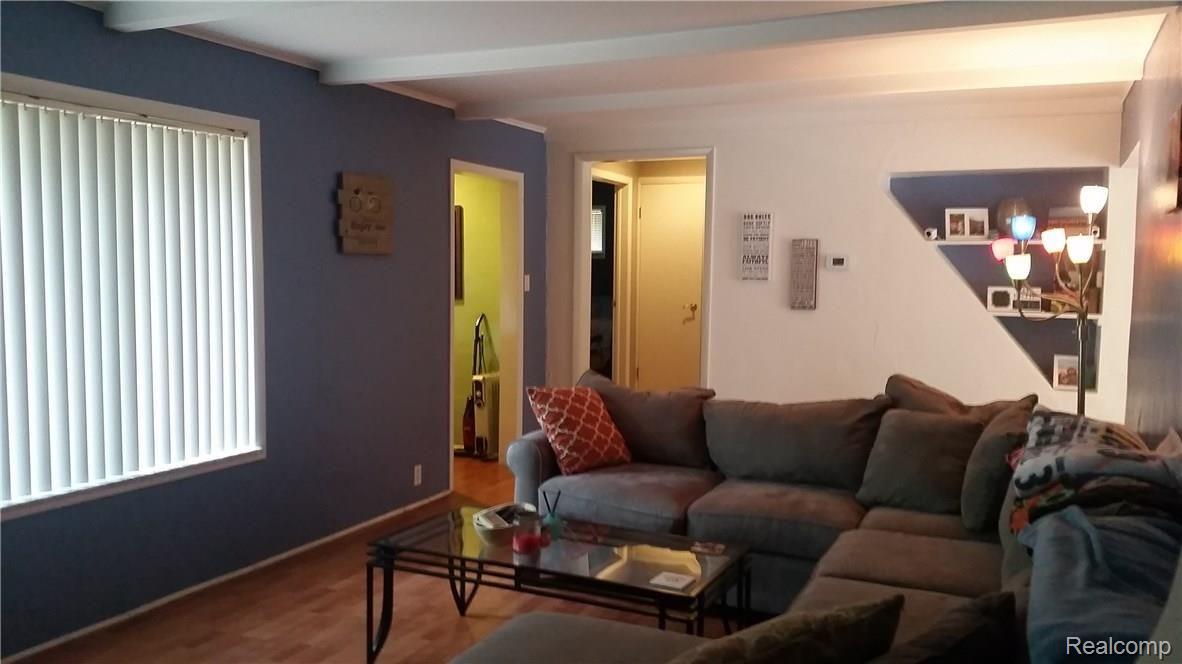 8493 Fletcher Road Grand Blanc, MI 48439 - Photo 10 of 14 Living Room with built in shelving.jpg