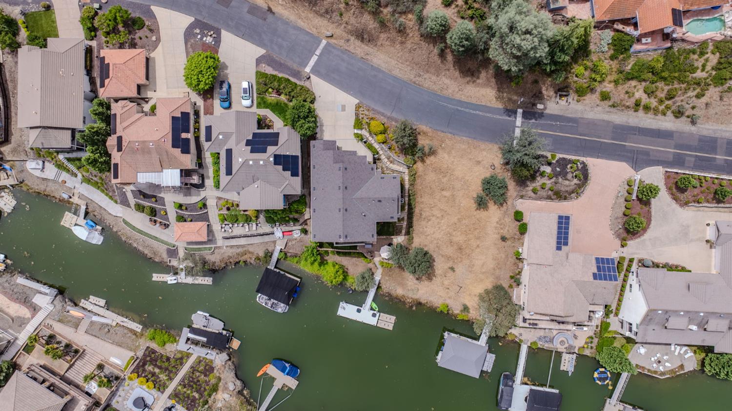 6066 Bluff View Road Copperopolis, CA 95228 - Photo 8 of 96 an aerial view of waterside residential houses with outdoor space
