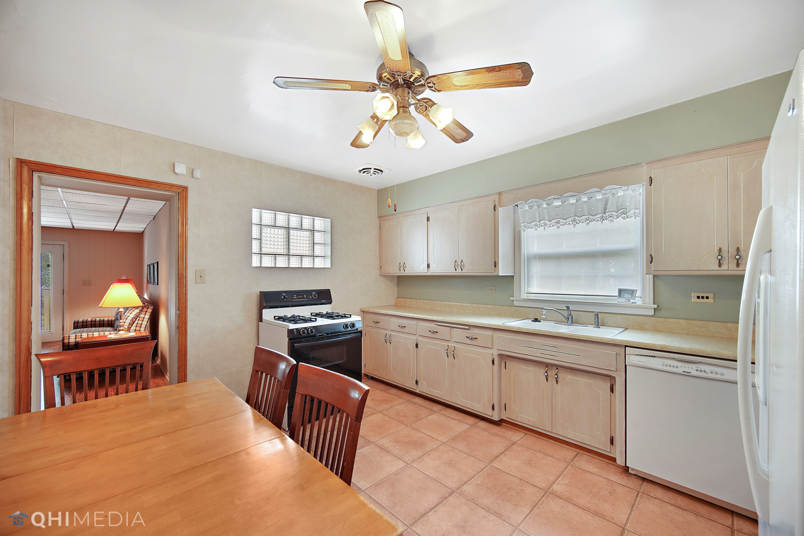1442 Ridge Road Homewood, IL 60430 - Photo 11 of 25 a kitchen with a sink stove and cabinets