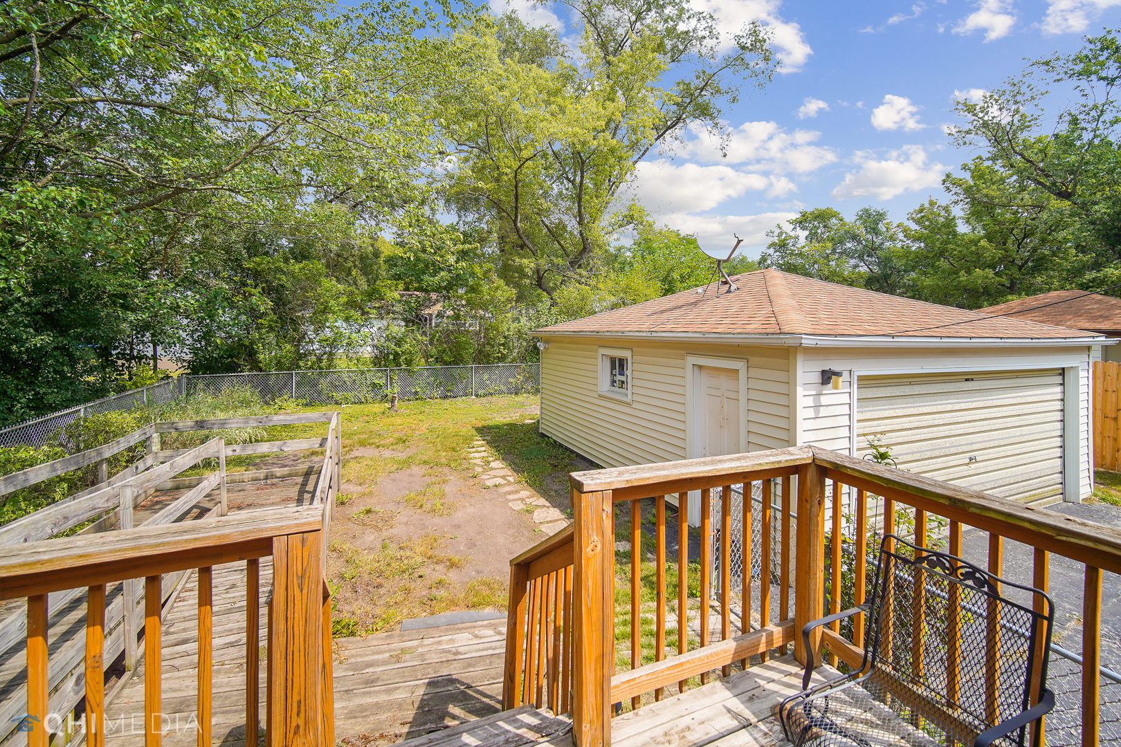 1442 Ridge Road Homewood, IL 60430 - Photo 23 of 25 a view of a wooden deck and a yard