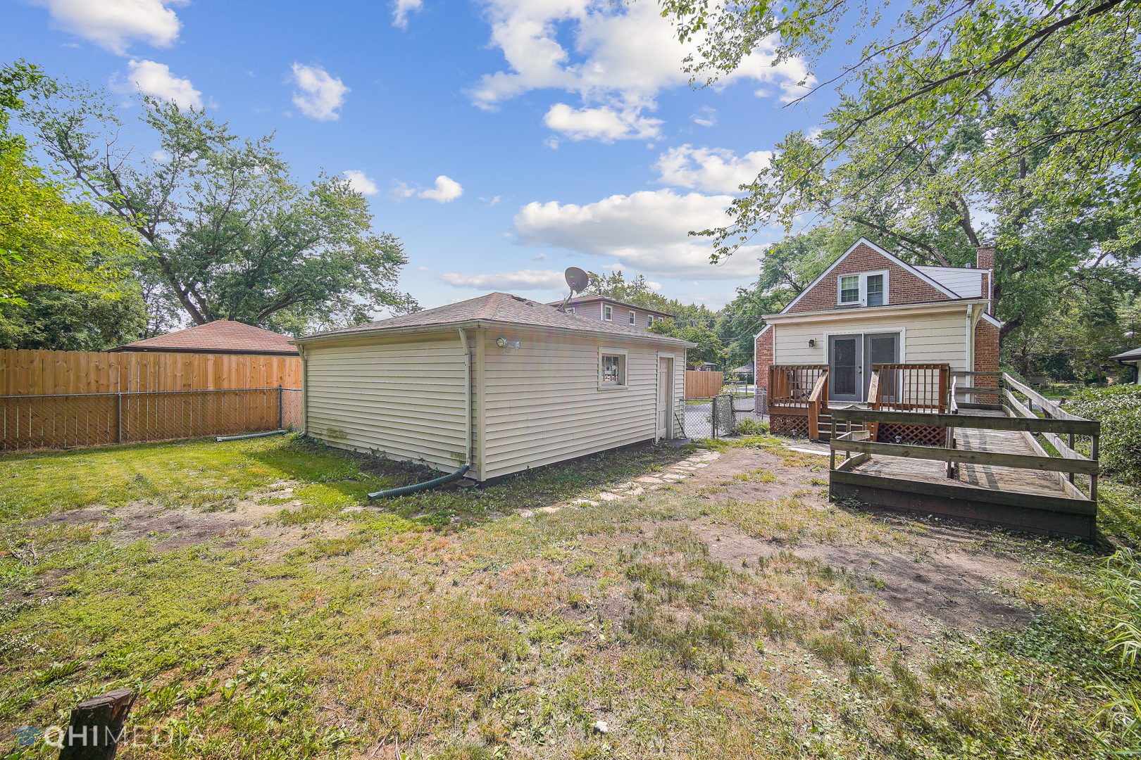 1442 Ridge Road Homewood, IL 60430 - Photo 25 of 25 a view of a house with a yard and sitting area