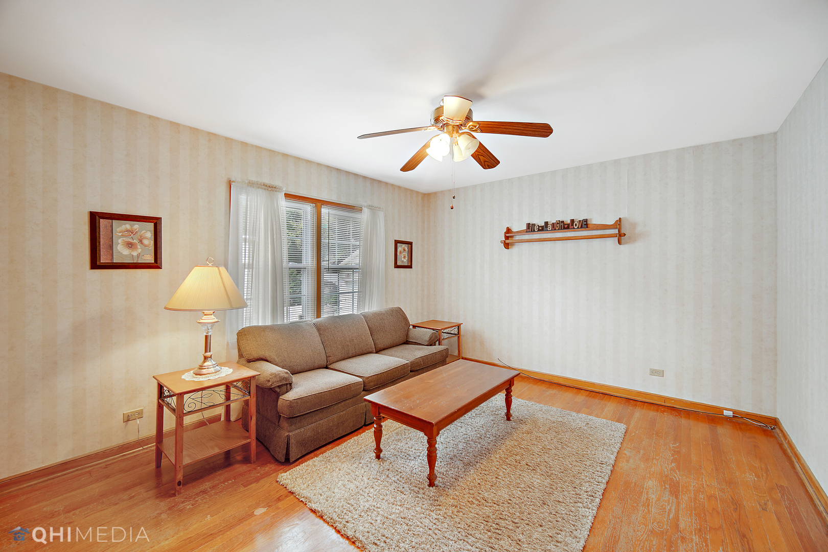 1442 Ridge Road Homewood, IL 60430 - Photo 5 of 25 a living room with furniture a rug and a window