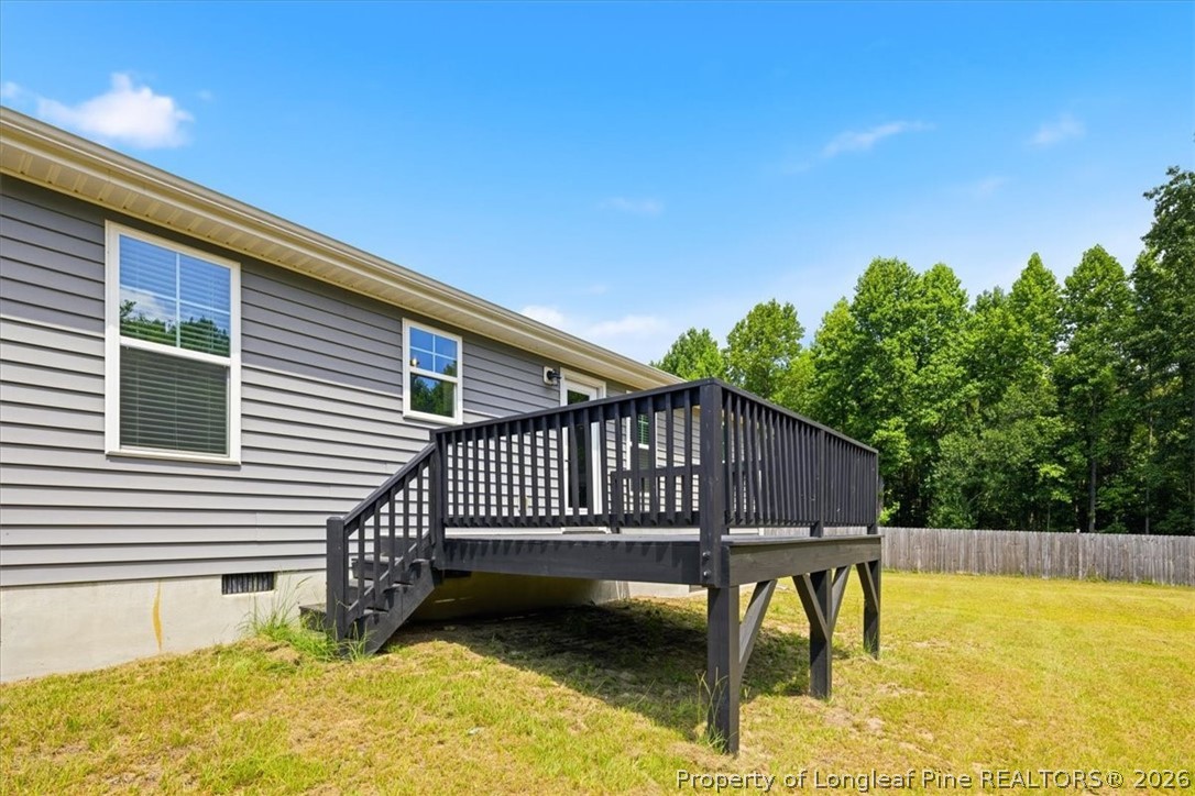 170 Starlight Road Lillington, NC 27546 - Photo 34 of 37 a view of a swimming pool with a deck