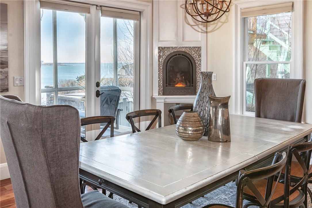 9 Cliff Terrace Newport, RI 02840 - Photo 14 of 40 Dining with cozy gas fireplace.