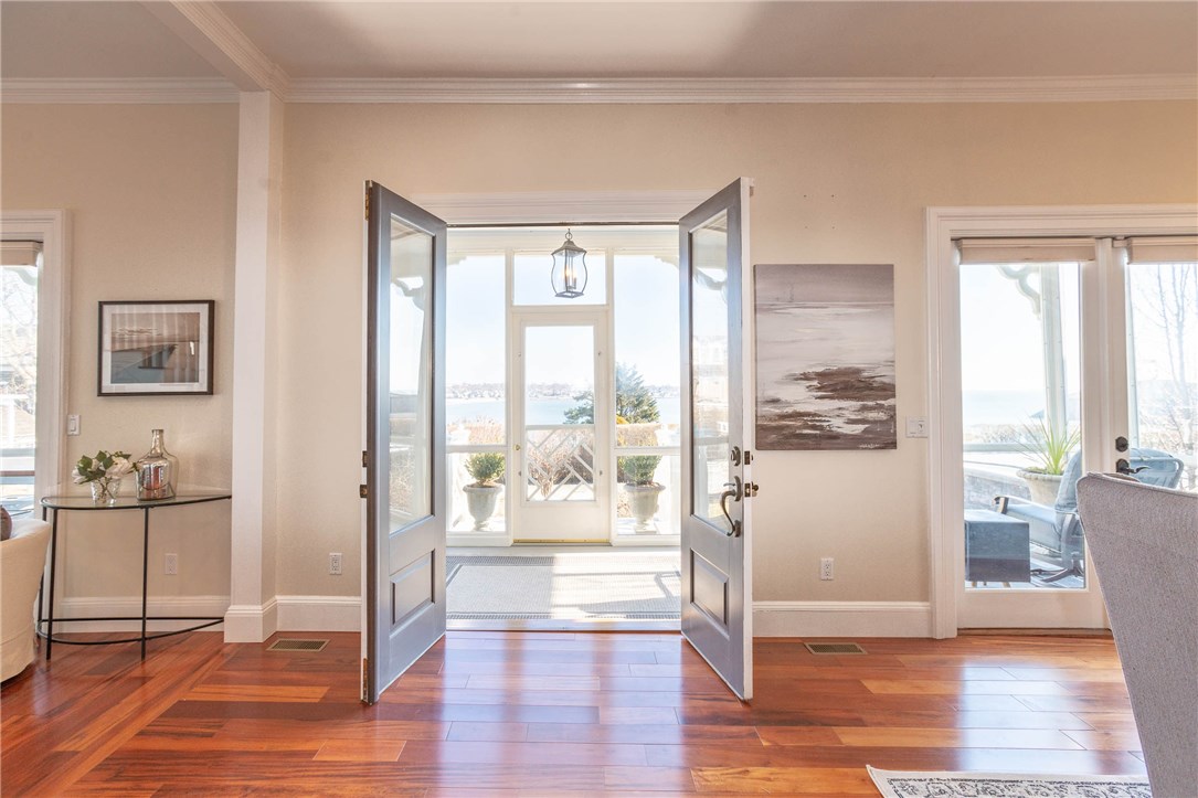 9 Cliff Terrace Newport, RI 02840 - Photo 20 of 40 Living area extends freely onto the ocean side enclosed porch.