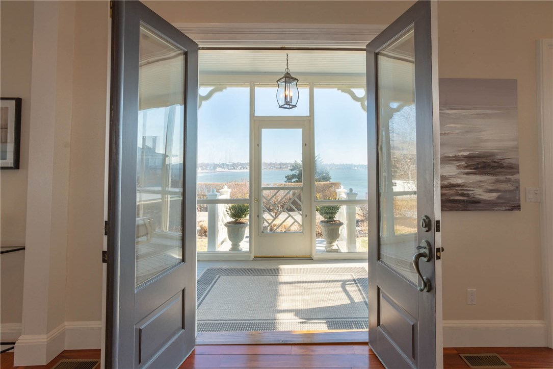 9 Cliff Terrace Newport, RI 02840 - Photo 10 of 40 Enclosed porch with beach and ocean views.