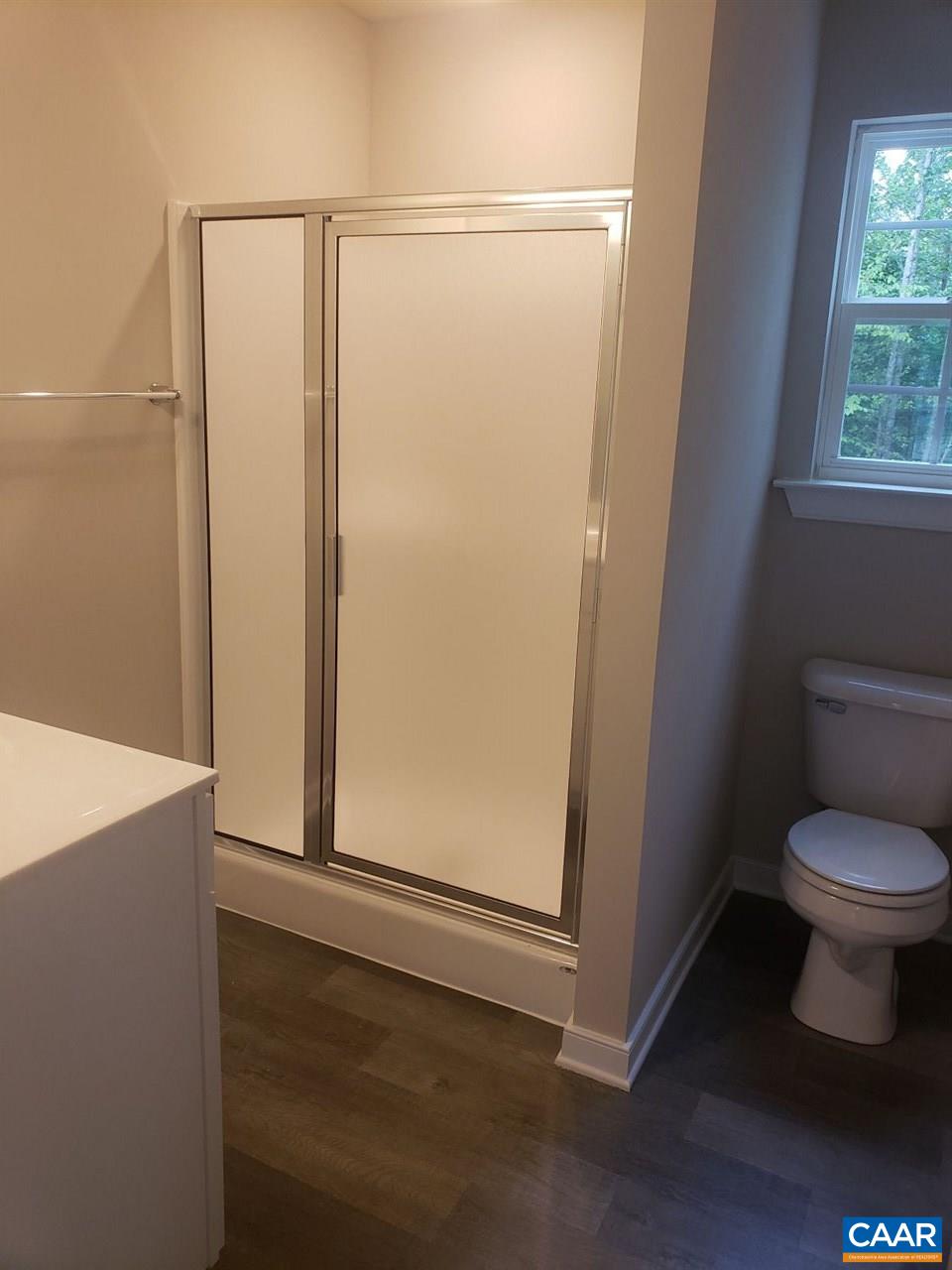16 Colonial Road, Unit LM 196/3 Palmyra, VA 22963 - Photo 16 of 24 a bathroom with a toilet and a shower