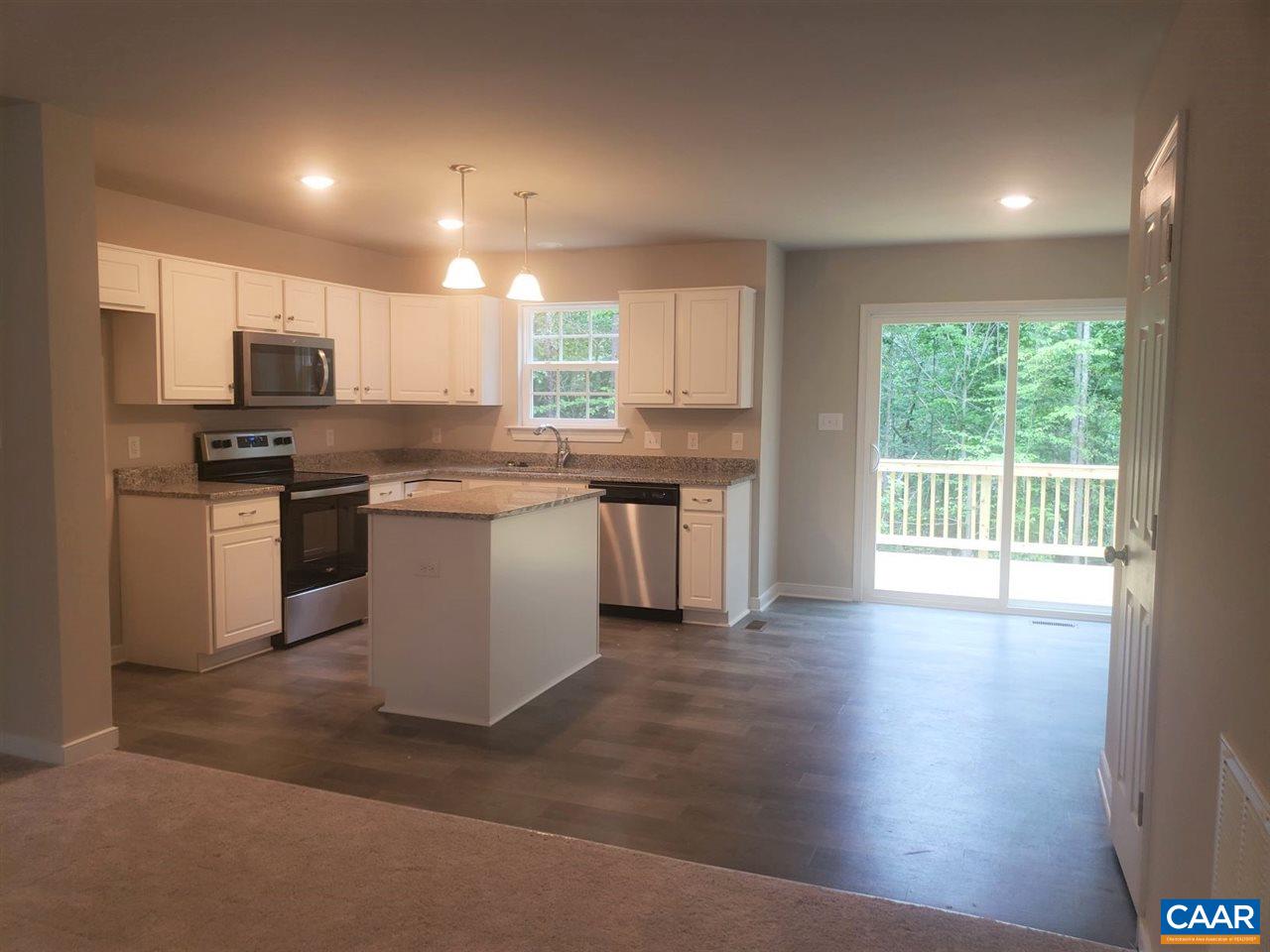 16 Colonial Road, Unit LM 196/3 Palmyra, VA 22963 - Photo 5 of 24 a kitchen with stainless steel appliances granite countertop a stove and a sink
