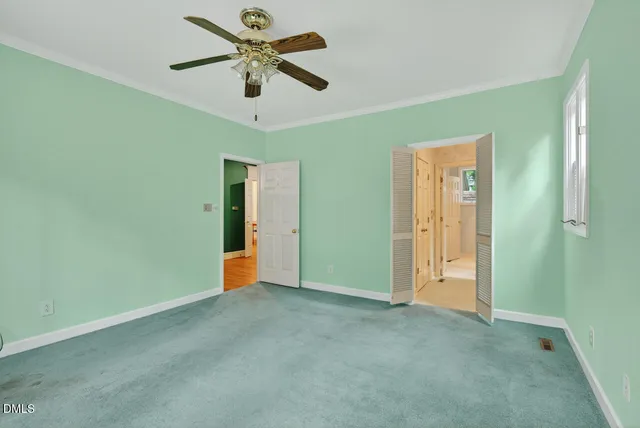 a view of empty room with windows