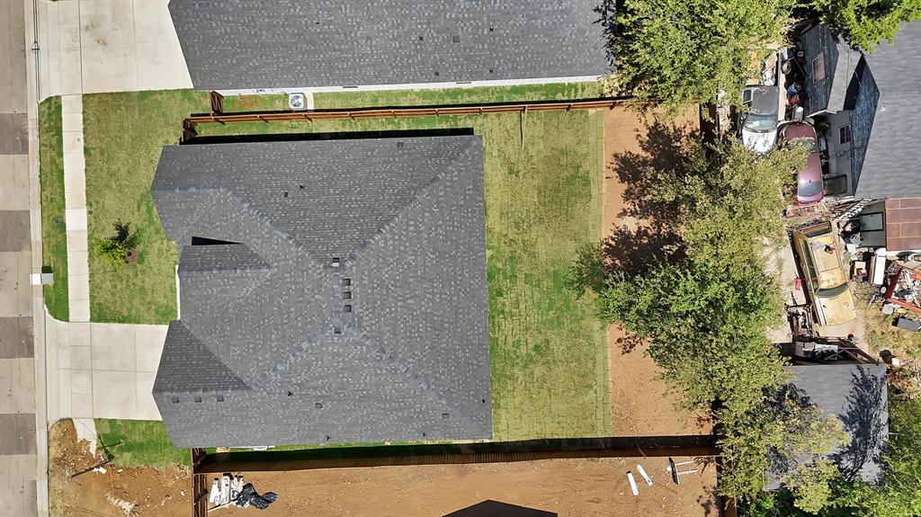 805 Tierney Road Fort Worth, TX 76112 - Photo 34 of 36 Newly installed asphalt shingle roof