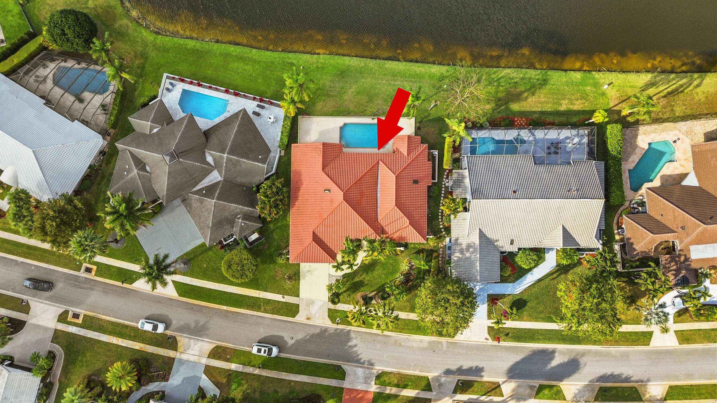 10747 Stonebridge Boulevard Boca Raton, FL 33498 - Photo 61 of 75 an aerial view of a house with a yard and potted plants