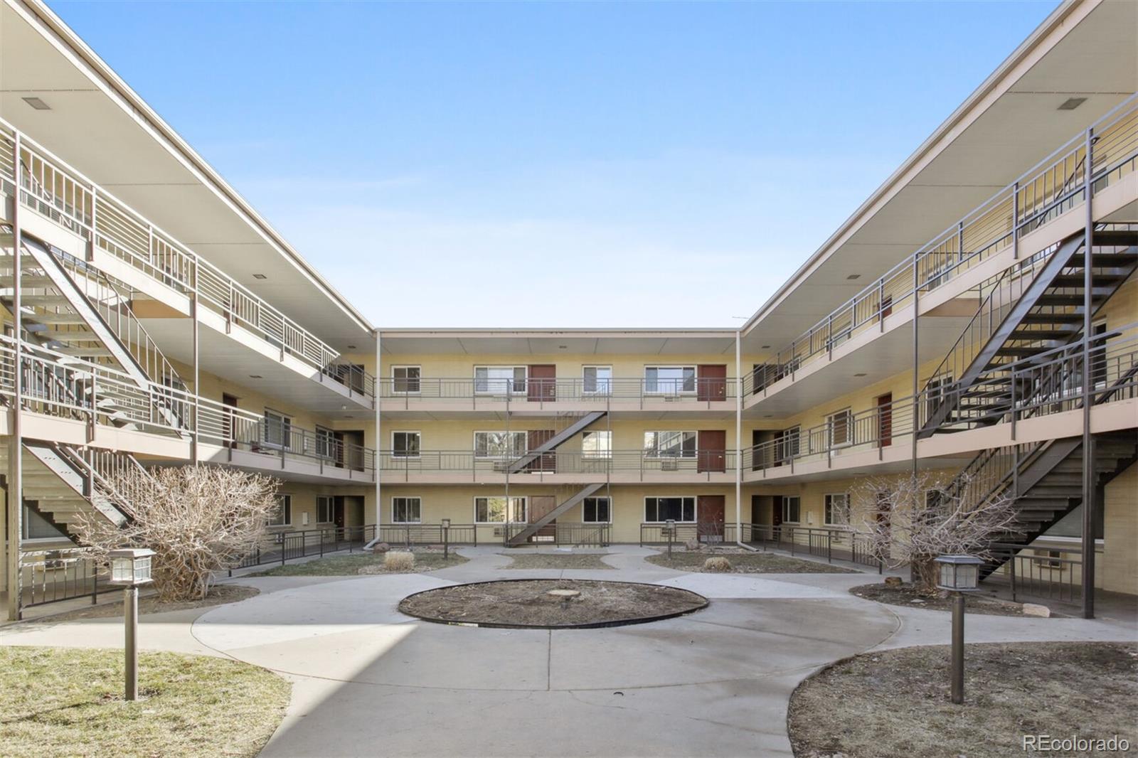 830 20th Street, Unit 304 Boulder, CO 80302 - Photo 18 of 25 a living room with furniture and a table