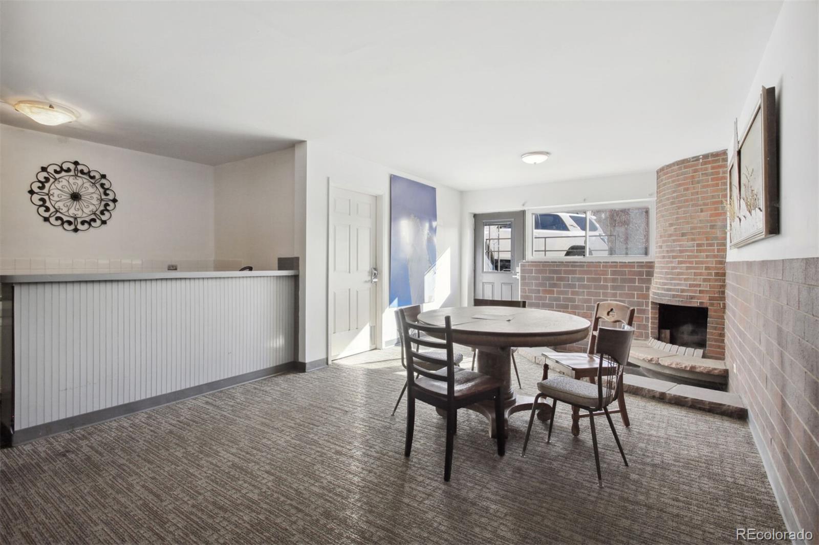 830 20th Street, Unit 304 Boulder, CO 80302 - Photo 22 of 25 a dining room with furniture and window