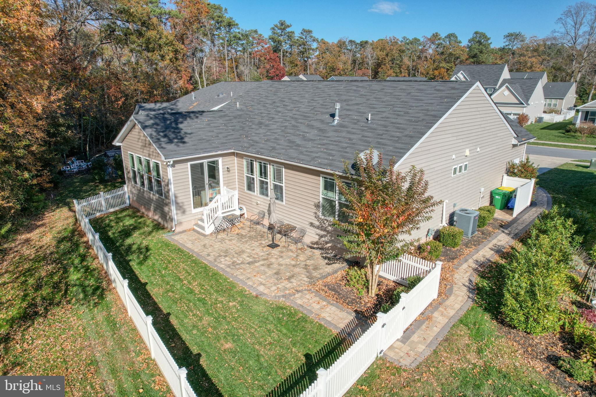 34273 Spring Brook Avenue Lewes, DE 19958 - Photo 2 of 73 a aerial view of a house with a yard