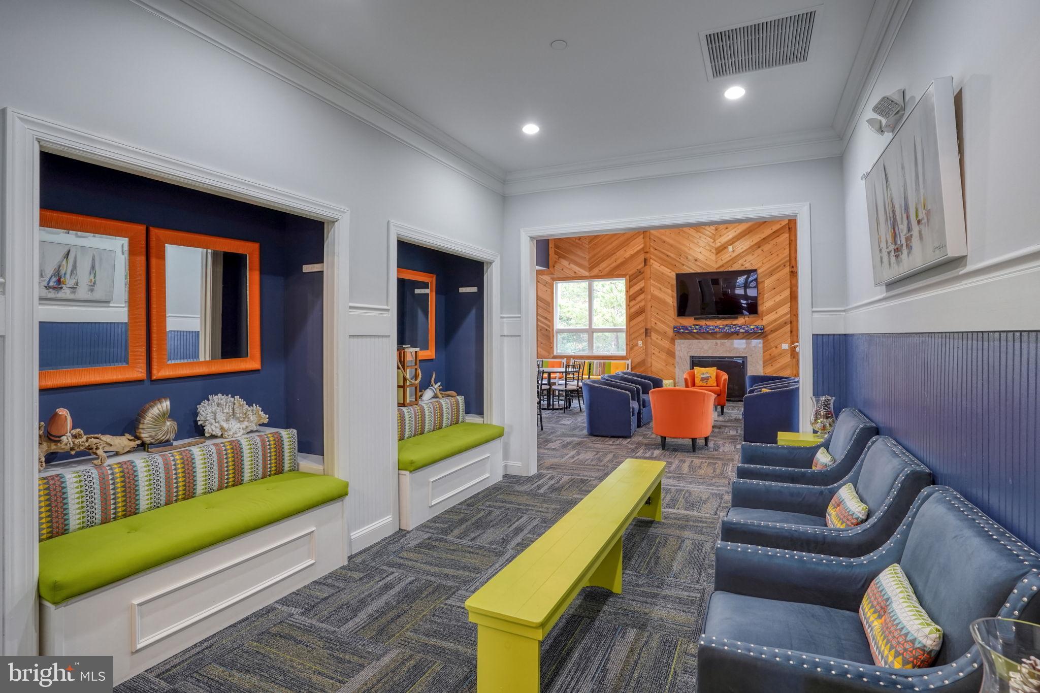 34273 Spring Brook Avenue Lewes, DE 19958 - Photo 52 of 73 a living room with furniture and a flat screen tv