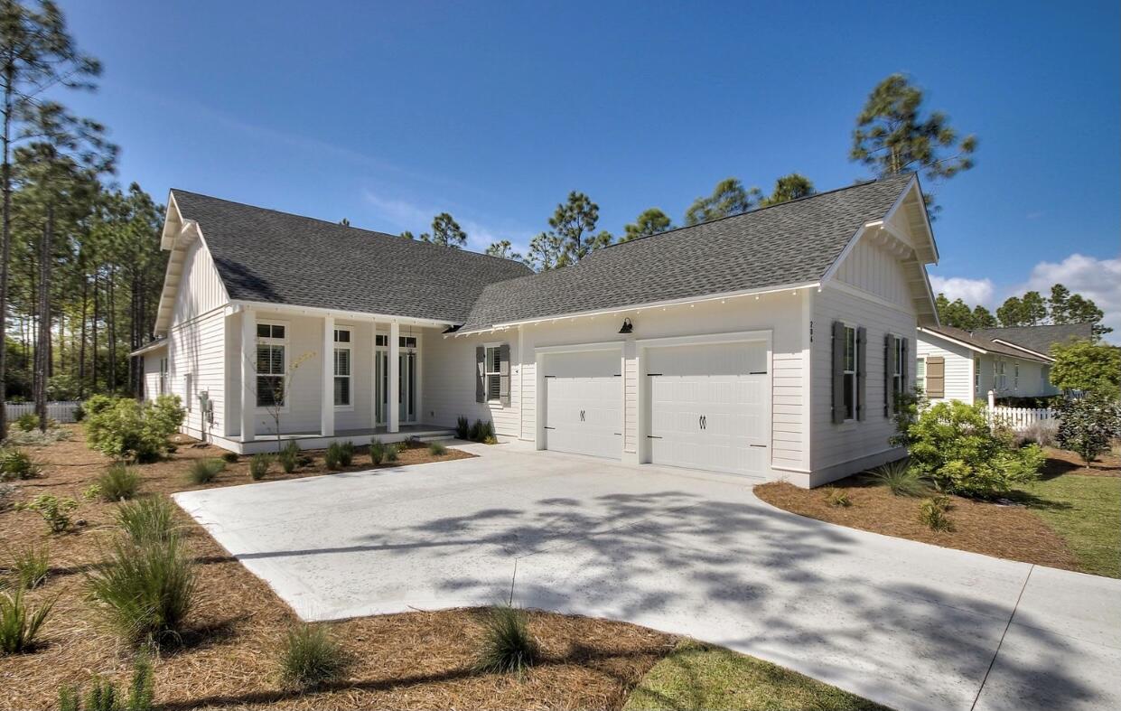 206 Poseidon Place Watersound, FL 32461 - Photo 1 of 1 a view of a house with a yard