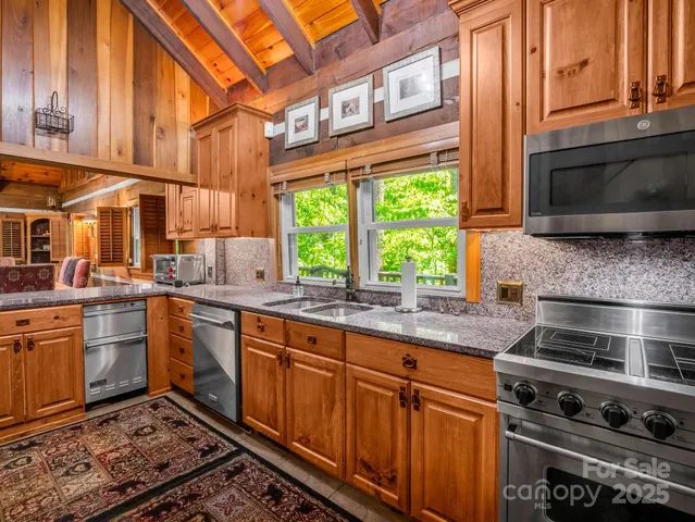 a view of a balcony with furniture