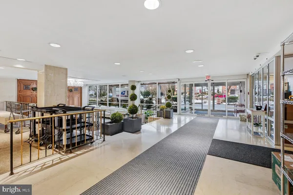 a living room with lots of furniture and a view of living room