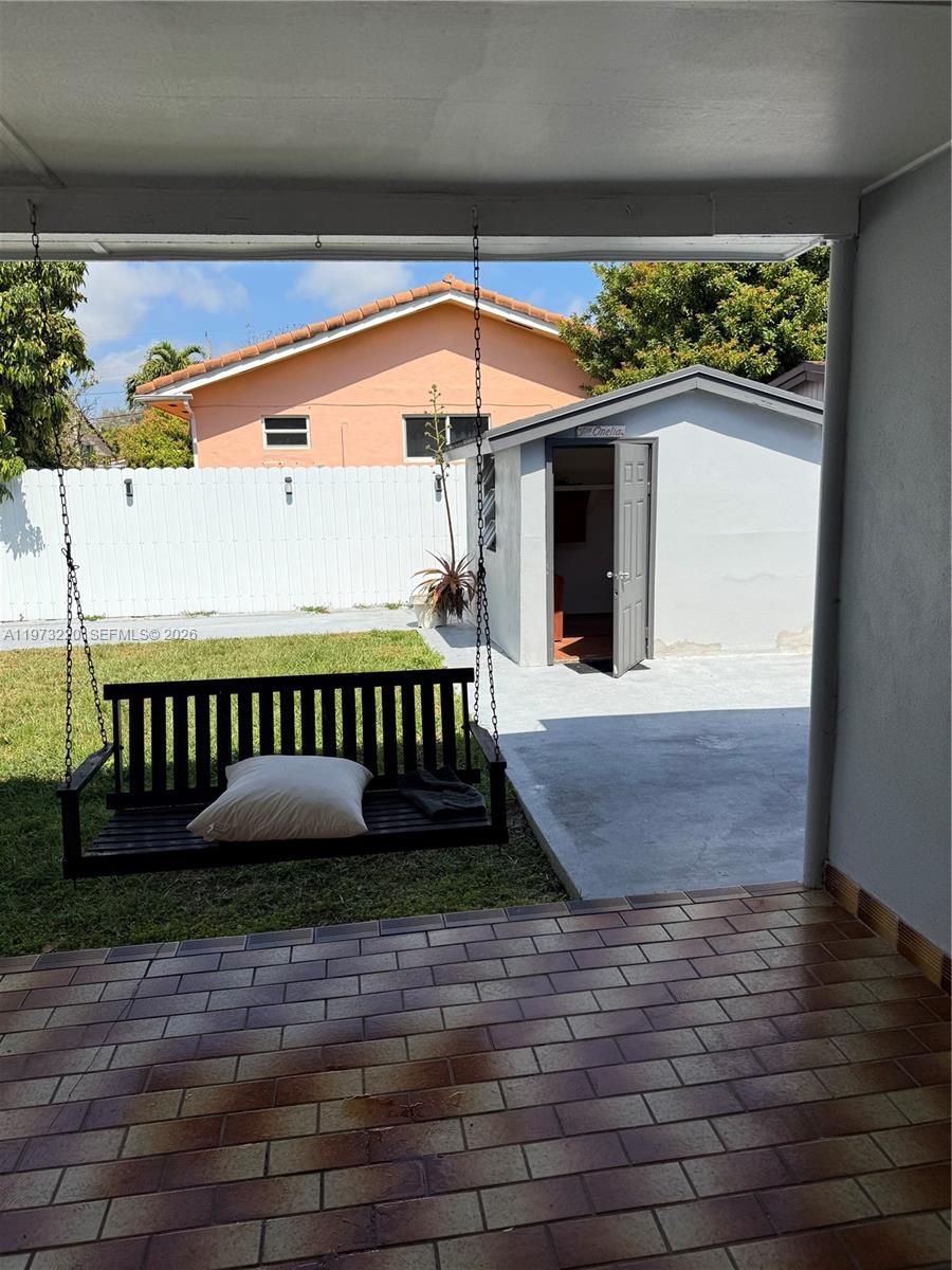 4255 Southwest 5th Terrace Miami, FL 33134 - Photo 17 of 29 a view of outdoor space deck and floor to ceiling window
