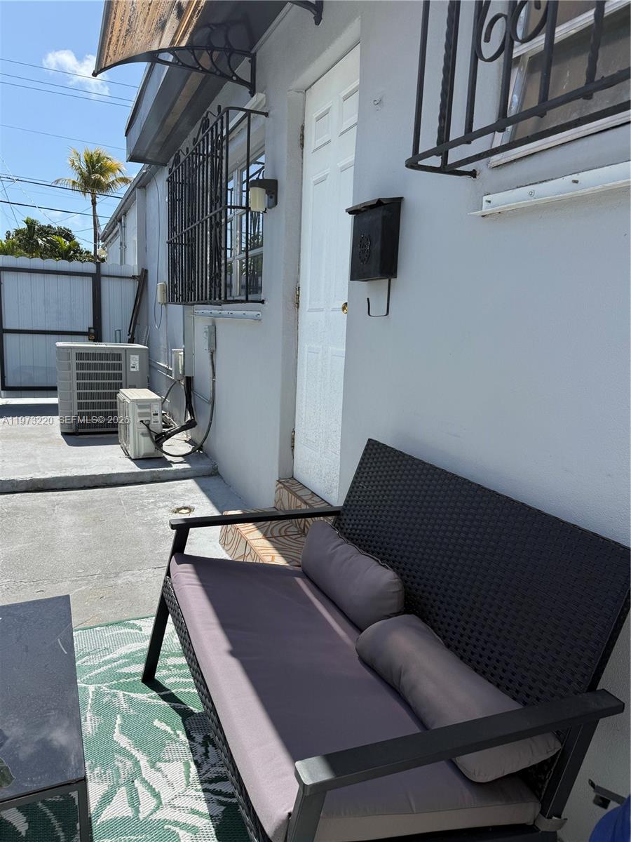 4255 Southwest 5th Terrace Miami, FL 33134 - Photo 20 of 29 a backyard of a house with seating space