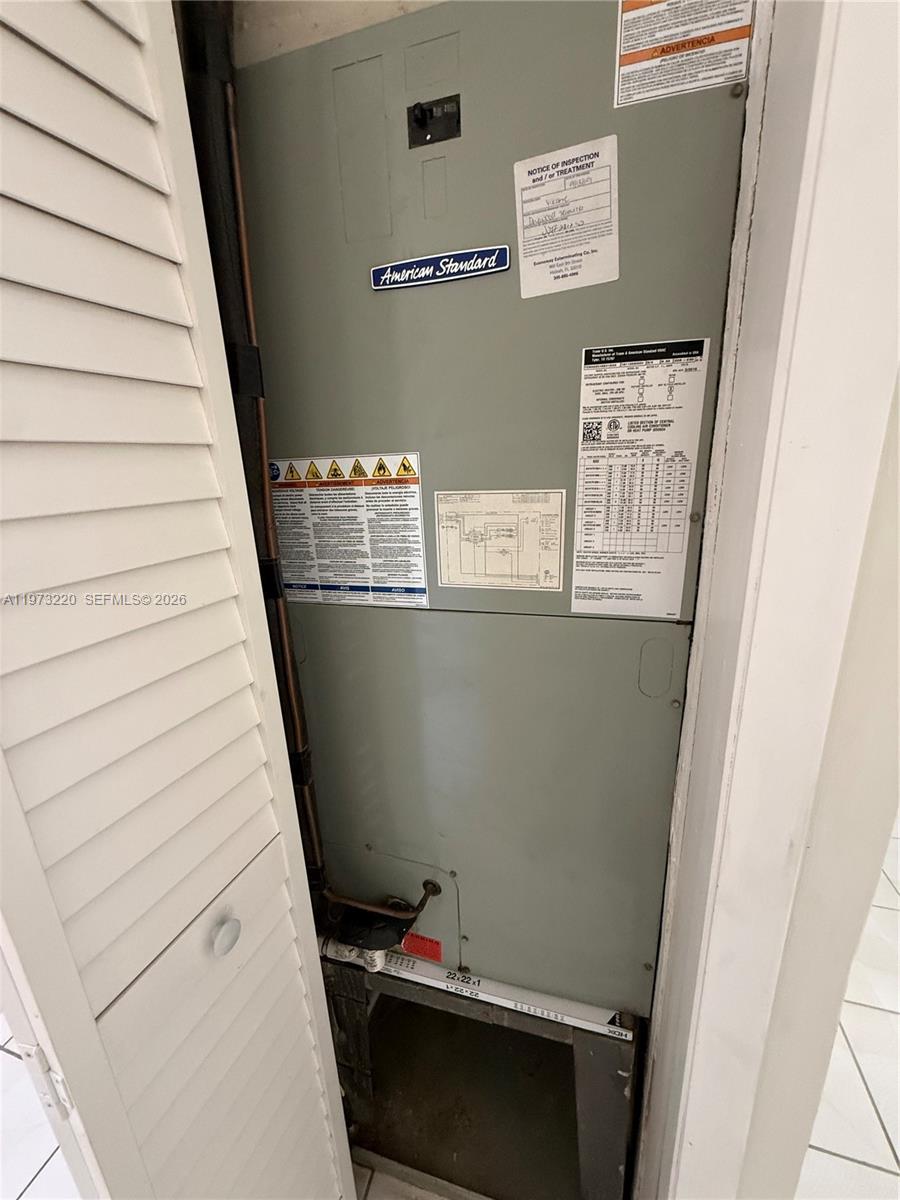 4255 Southwest 5th Terrace Miami, FL 33134 - Photo 26 of 29 a view of storage and utility room with wooden floor