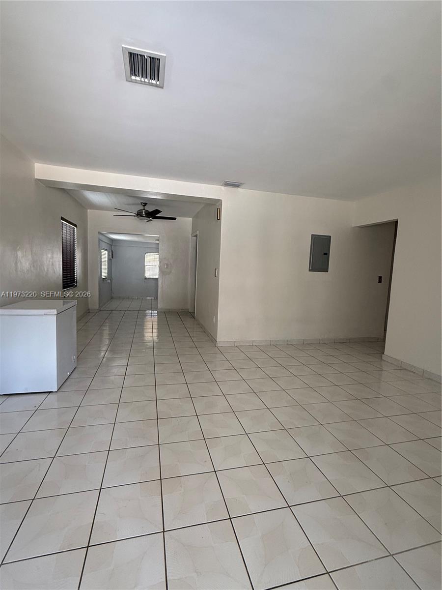 4255 Southwest 5th Terrace Miami, FL 33134 - Photo 5 of 29 a view of a livingroom with an empty space and a sink