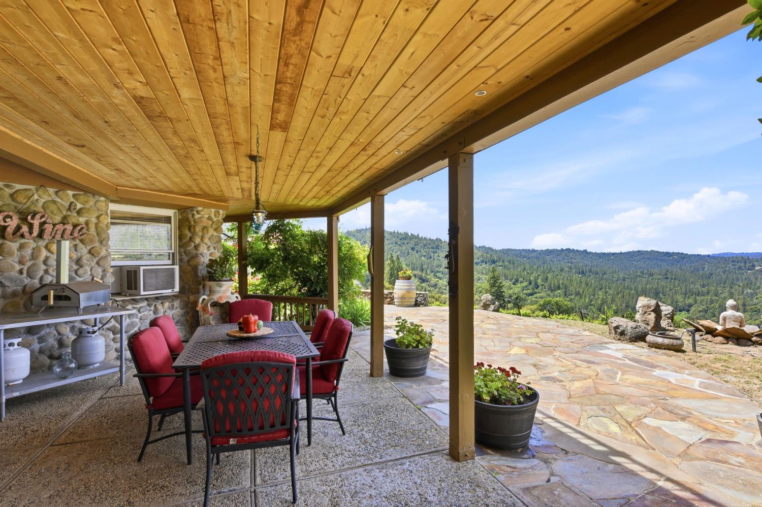 7201 Happy Valley Road Somerset, CA 95684 - Photo 39 of 75 The seller enjoys making fire roasted pizza in their pizza oven while sipping wine and entertaining on this incredible covered patio.