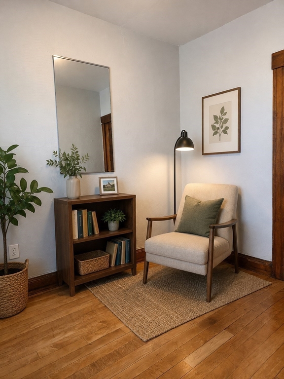 2 Hillside Street, Unit 3 Worcester, MA 01610 - Photo 5 of 30 a living room with furniture and wooden floor