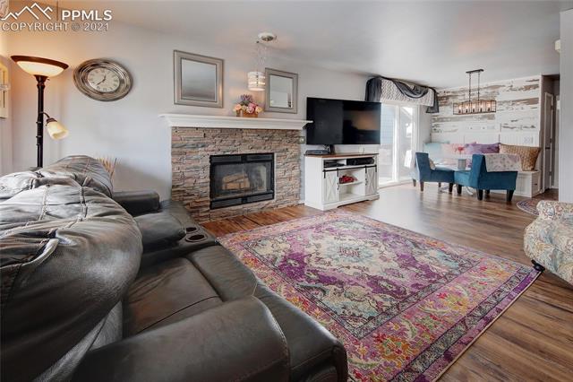 8084 Oliver Road Peyton, CO 80831 - Photo 3 of 33 An actual WOOD BURNING fireplace!!!
