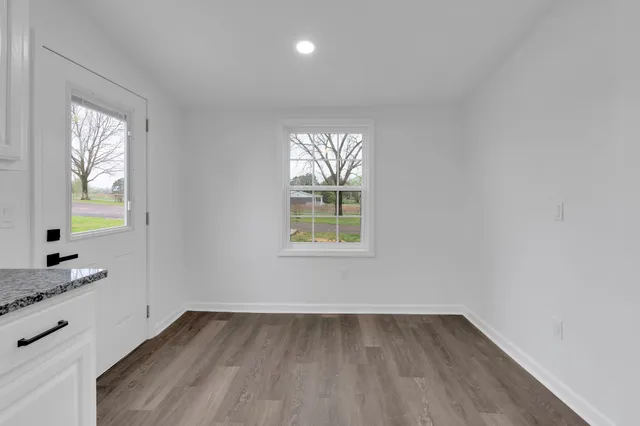 a view of a kitchen and a window
