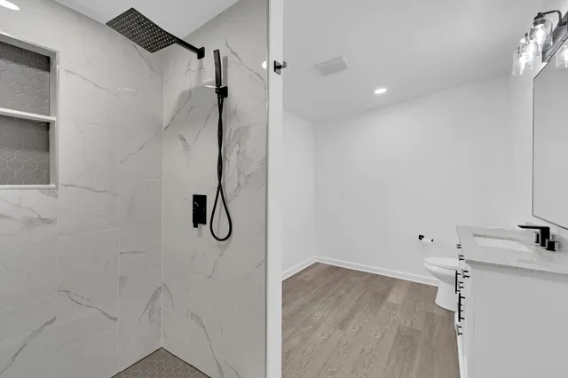 a view of a kitchen cabinets and empty room