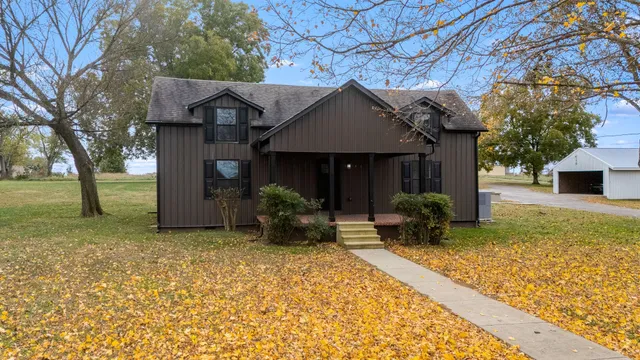 a view of swimming pool with a patio