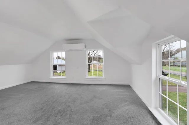 a view of an ocean and a mountain