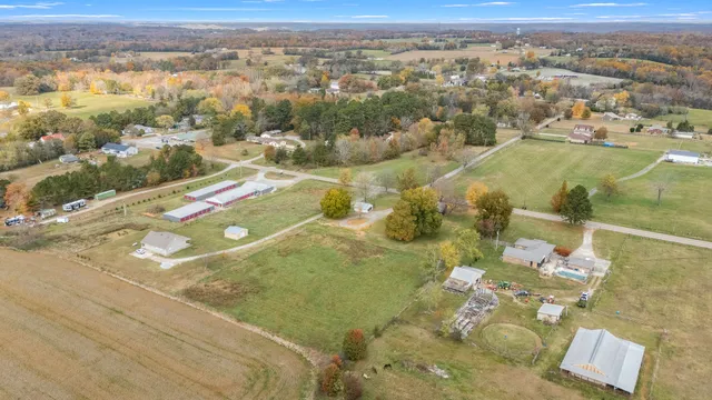 a view of a field with trees