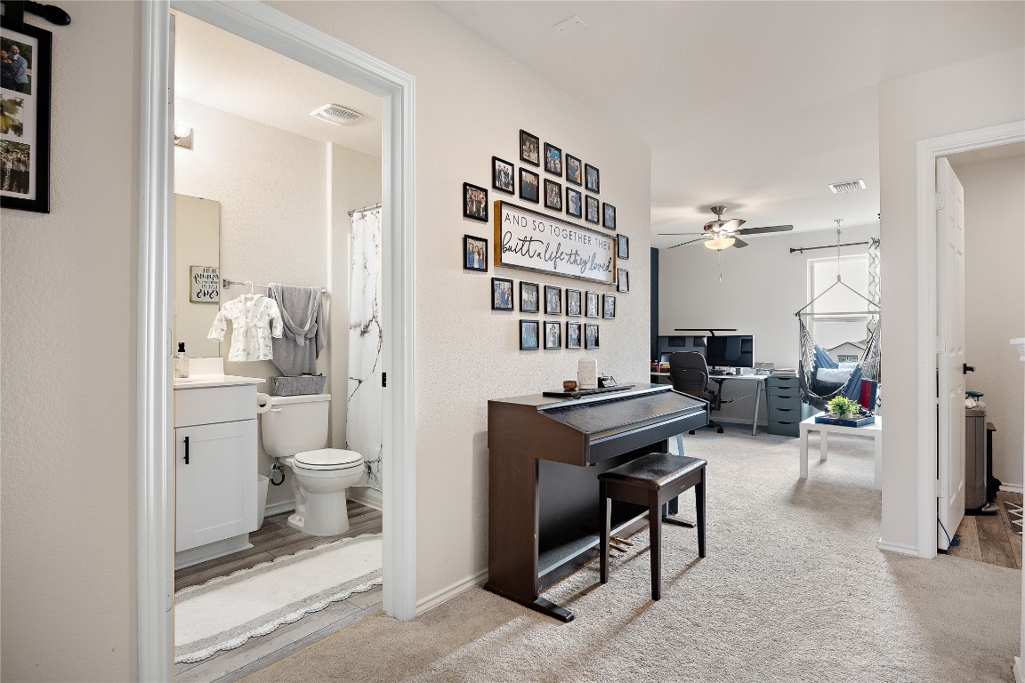 104 Hellfighters Way Jarrell, TX 76537 - Photo 11 of 27 a view of a room with gym equipment