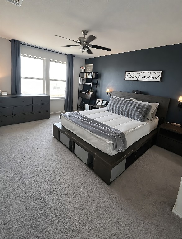 104 Hellfighters Way Jarrell, TX 76537 - Photo 14 of 27 a spacious bedroom with a bed and a window