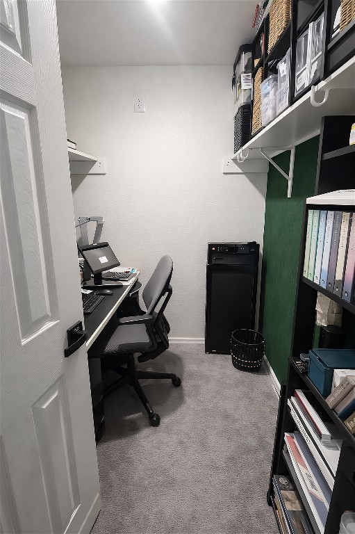 104 Hellfighters Way Jarrell, TX 76537 - Photo 17 of 27 a view of workspace with chair and wooden floor