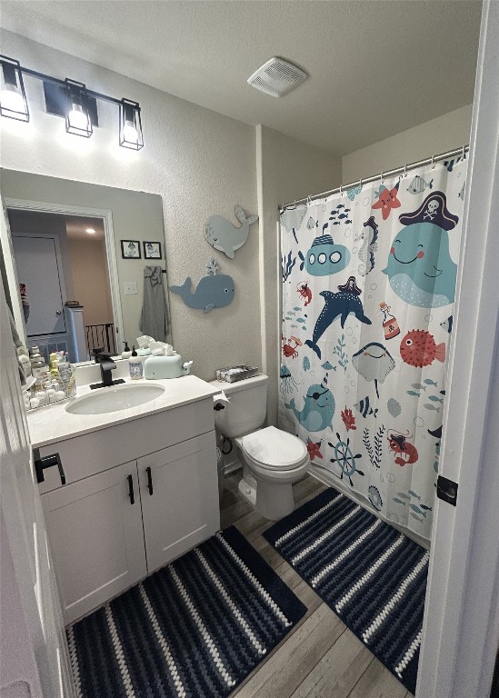 104 Hellfighters Way Jarrell, TX 76537 - Photo 21 of 27 a bathroom with a sink toilet and shower
