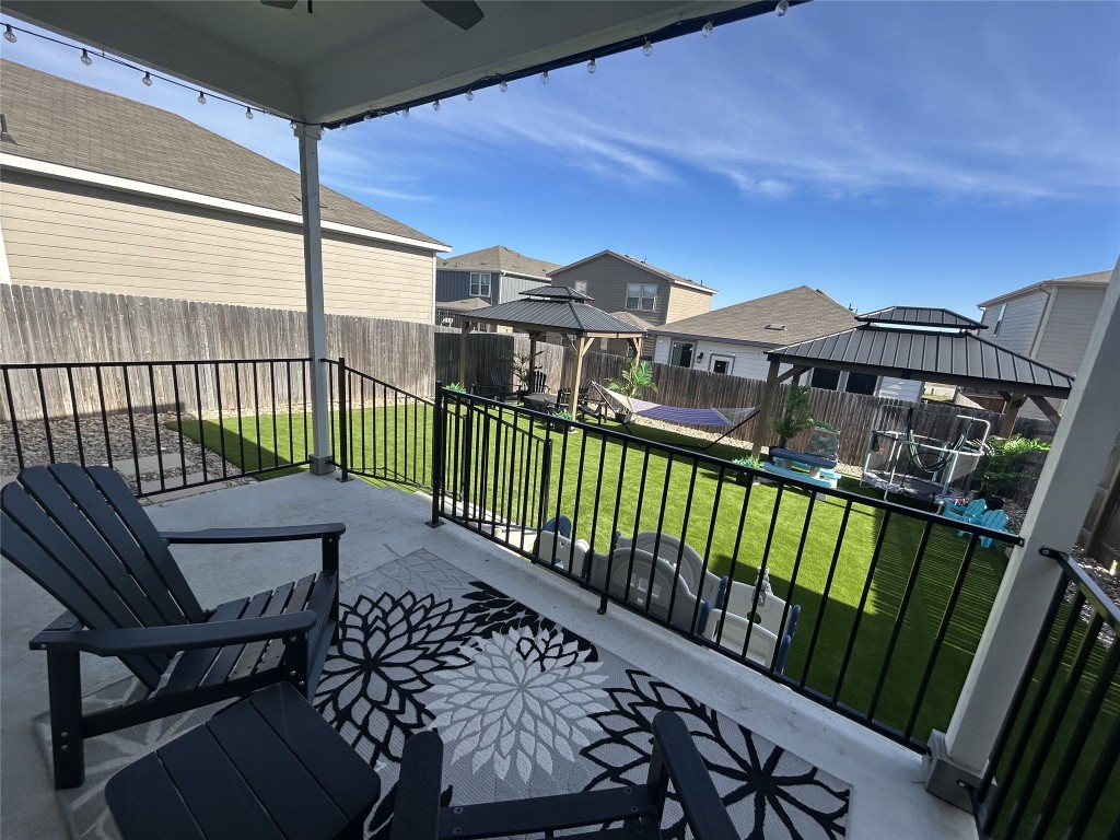 104 Hellfighters Way Jarrell, TX 76537 - Photo 24 of 27 a view of a chairs on the roof deck