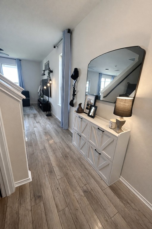 104 Hellfighters Way Jarrell, TX 76537 - Photo 5 of 27 a living room with furniture and a wooden floor