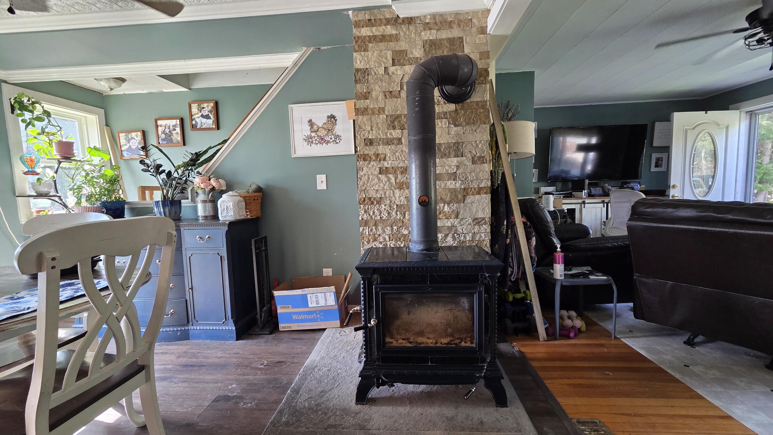 2670 Bennoch Road Old Town, ME 04468 - Photo 11 of 59 Wood Stove in Dining Rm