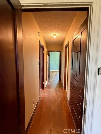 a bathroom with a sink mirror and toilet